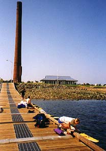 Maren, Greg and Melissa loading kayaks