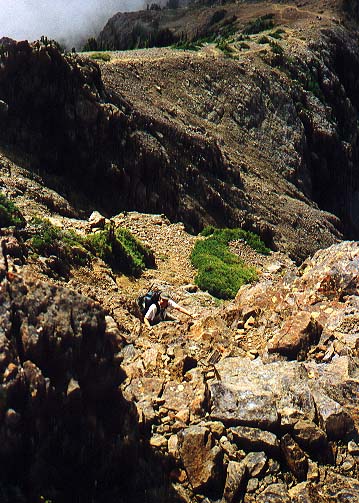 Troy starting to scramble up false summit