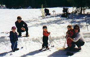 Bryden, Kelly and Lizzie trying out their skis