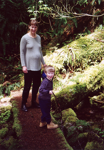 Bryden and Maren walking across one of the many short stream bridges